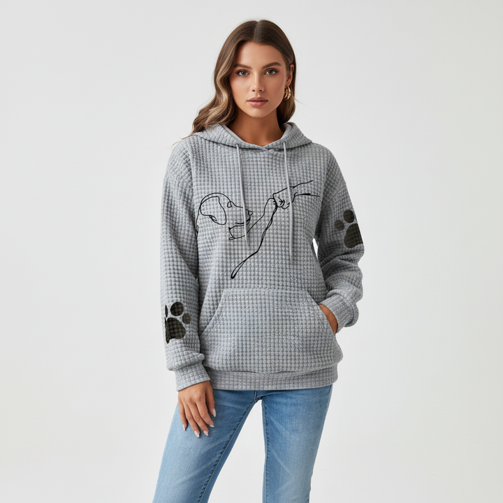 Detail of the 'Wilma' dog graphic on a women's cozy fleece hoodie, animal lover's choice