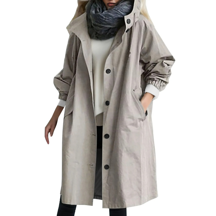 Versatile women's windproof hooded trench, ideal stylish jacket for weather protection. Comfortable fit.