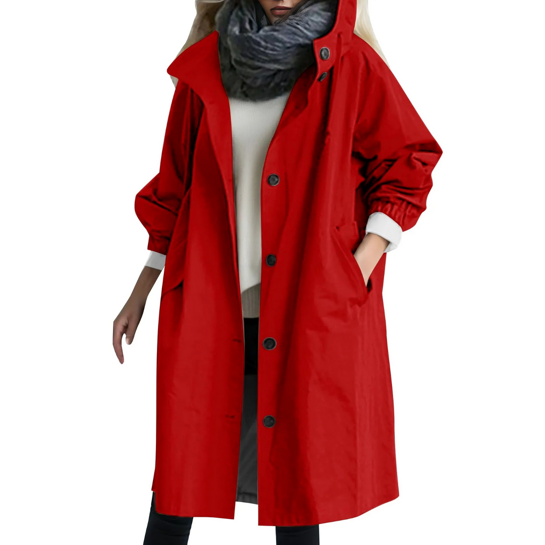 Fashionable women's long hooded trench coat, combining elegant style with essential windproof function.