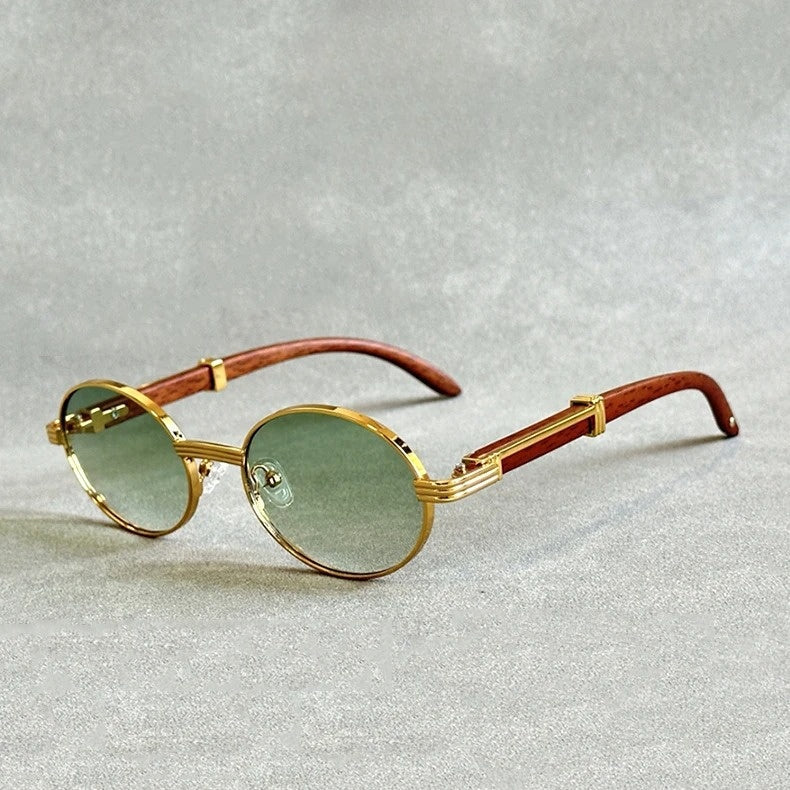 Designer quality women's round sunglasses, unique woodgrain pattern, elegant silver accents. Vintage fashion eyewear.