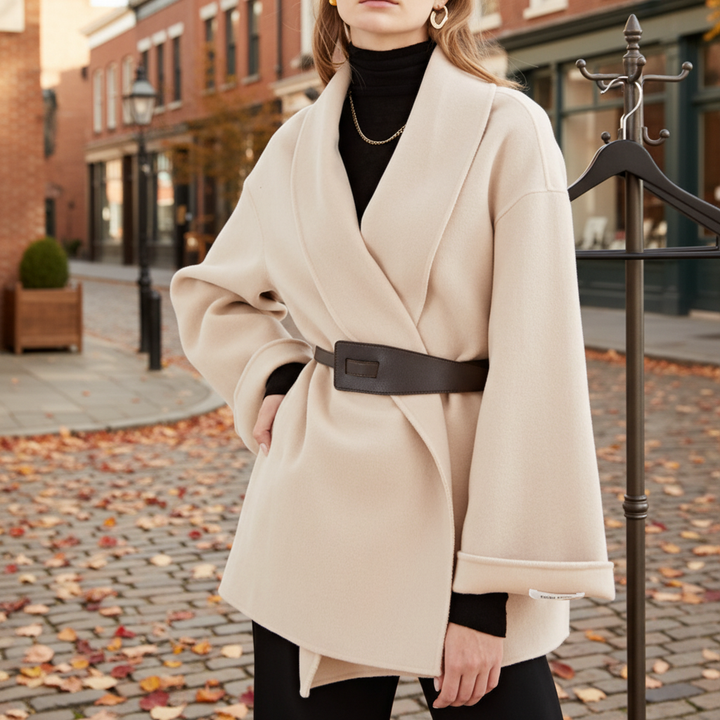 Women's wool belted long coat with classic lapel collar, perfect for winter and fall fashion.