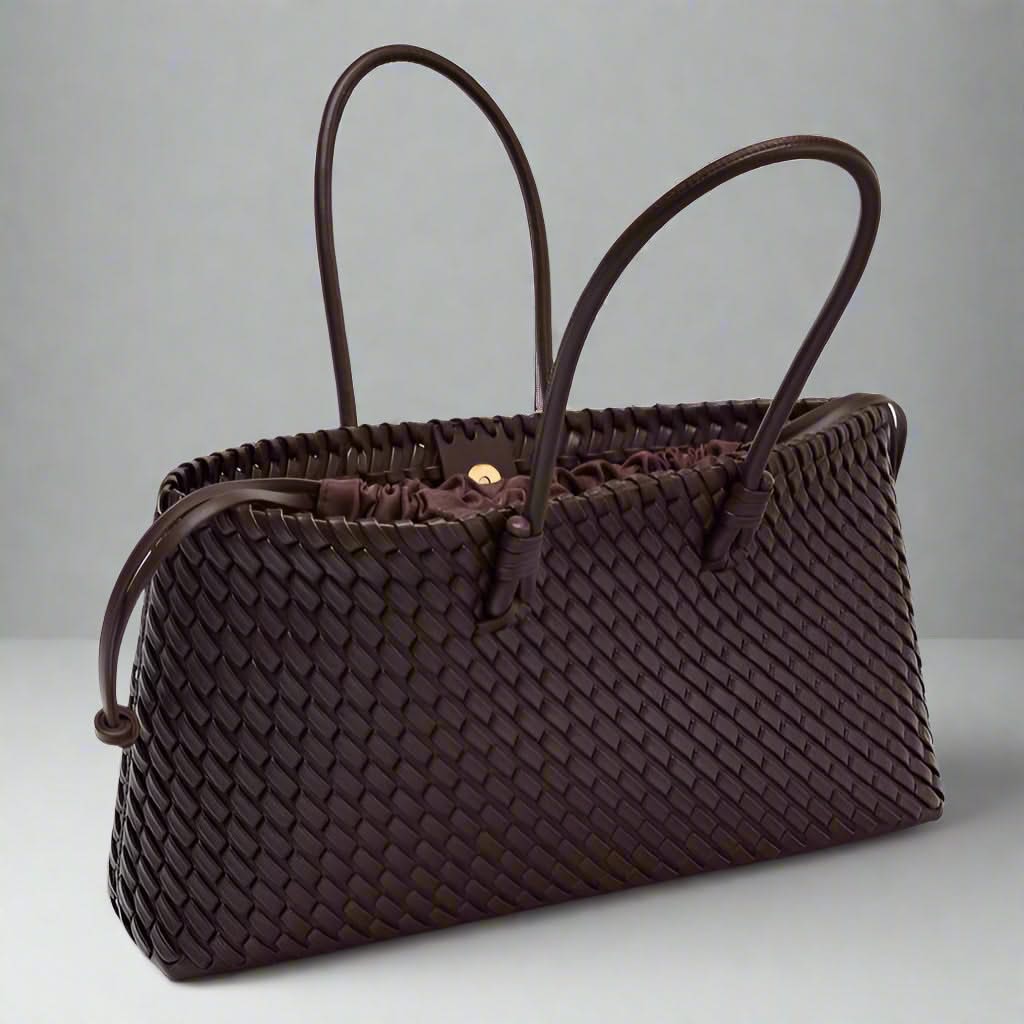 Close-up: Women's woven leather handbag, showcasing unique textured leather design.