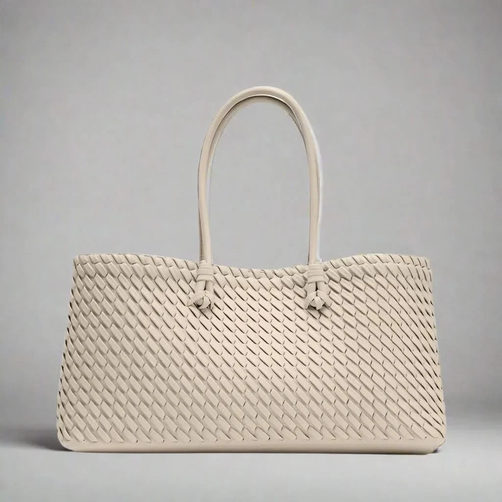 Versatile women's woven leather shoulder bag, offering style and everyday functionality.