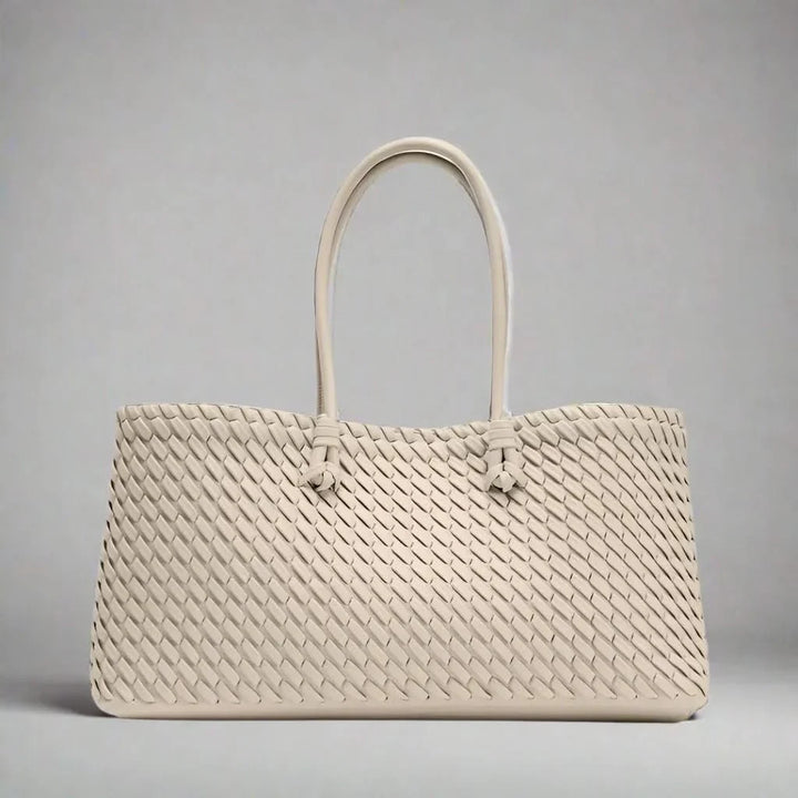 Versatile women's woven leather shoulder bag, offering style and everyday functionality.