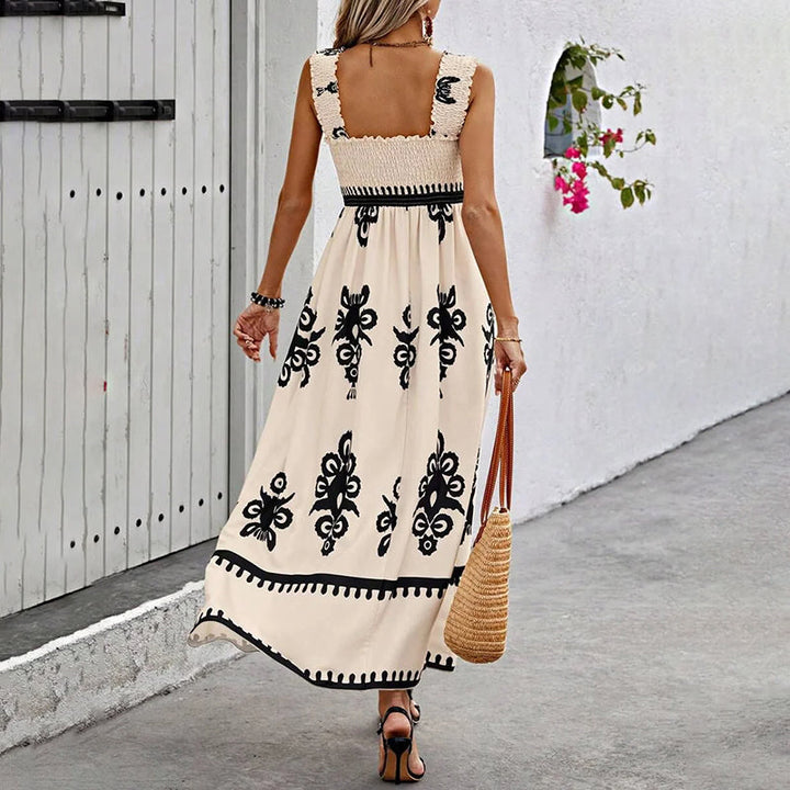Elegant women's flowy maxi dress with wrap detail, a fashionable summer and beach essential