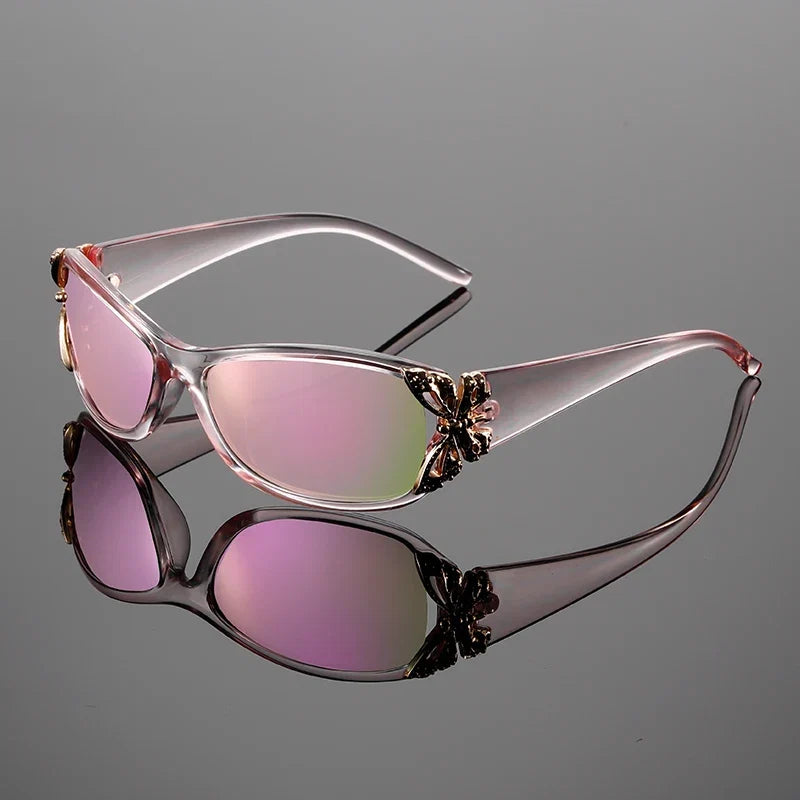 Women's Y2K butterfly accent sunglasses with UV protection. Glamorous retro eyewear, a lightweight fashion accessory.
