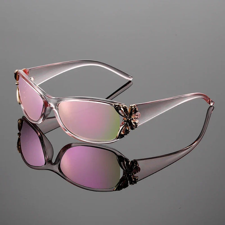 Women's Y2K butterfly accent sunglasses with UV protection. Glamorous retro eyewear, a lightweight fashion accessory.
