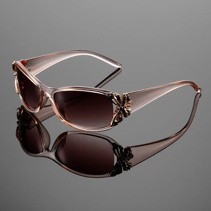 Women's glamorous butterfly Y2K sunglasses. Retro eyewear with essential UV protection, a fashionable statement accessory.