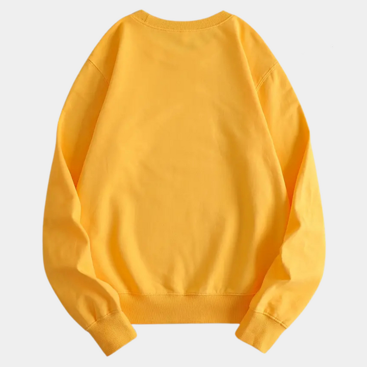 Comfortable women's yellow long-sleeve sweatshirt with vibrant floral print, perfect for relaxed style.