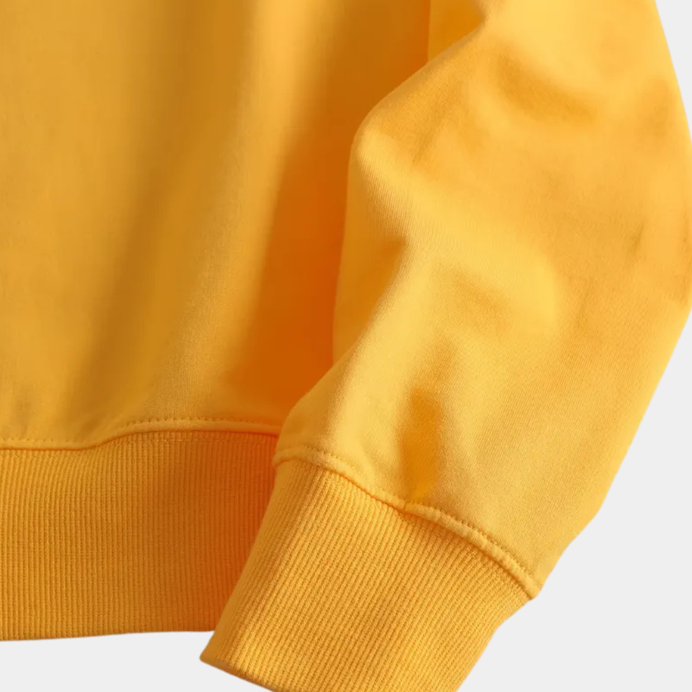 Relaxed fit women's yellow top with a beautiful floral print, a cozy choice for casual outfits.