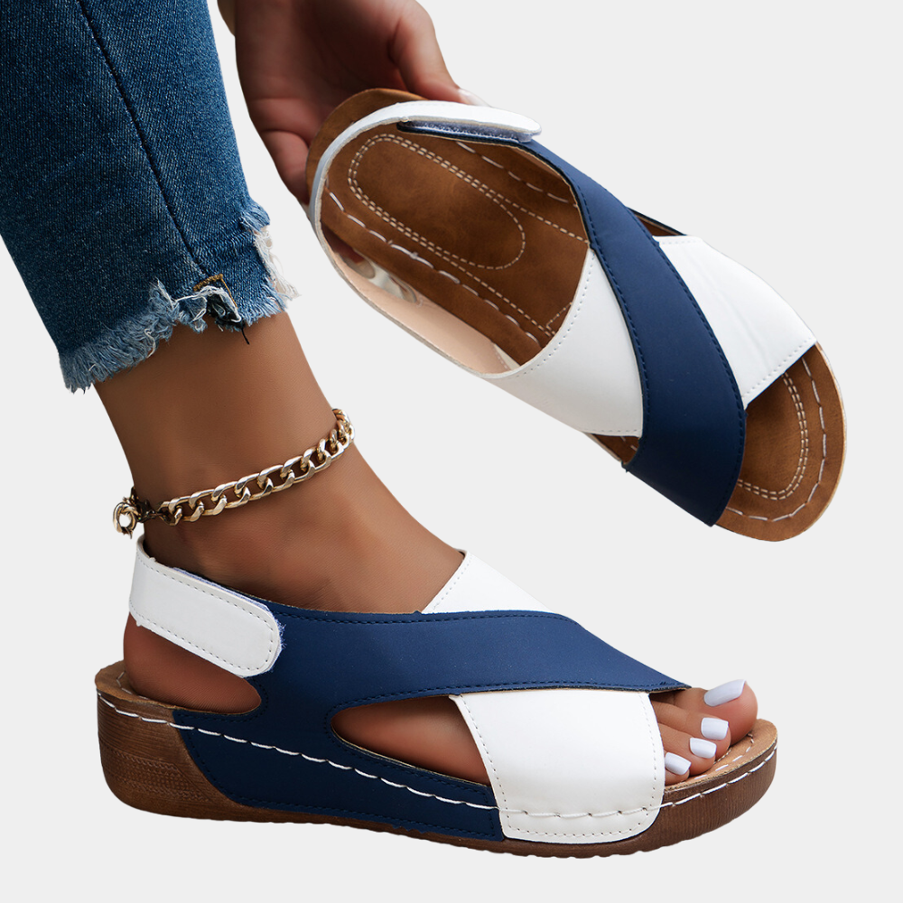 Chic Yola women's adjustable flat sandals, perfect stylish footwear for everyday summer comfort.