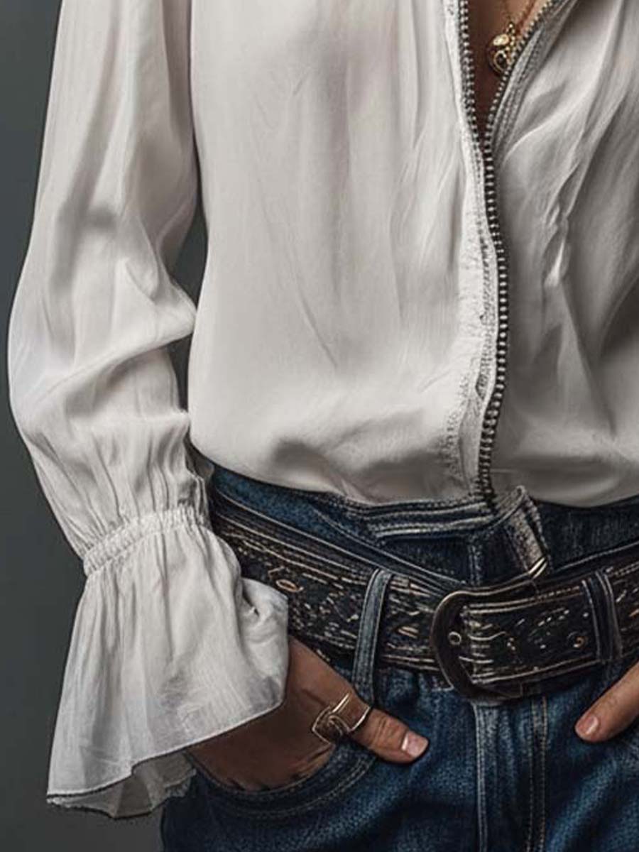 Versatile women's blouse with a sleek zip front and stylish bell cuffs. Ideal for office or everyday.