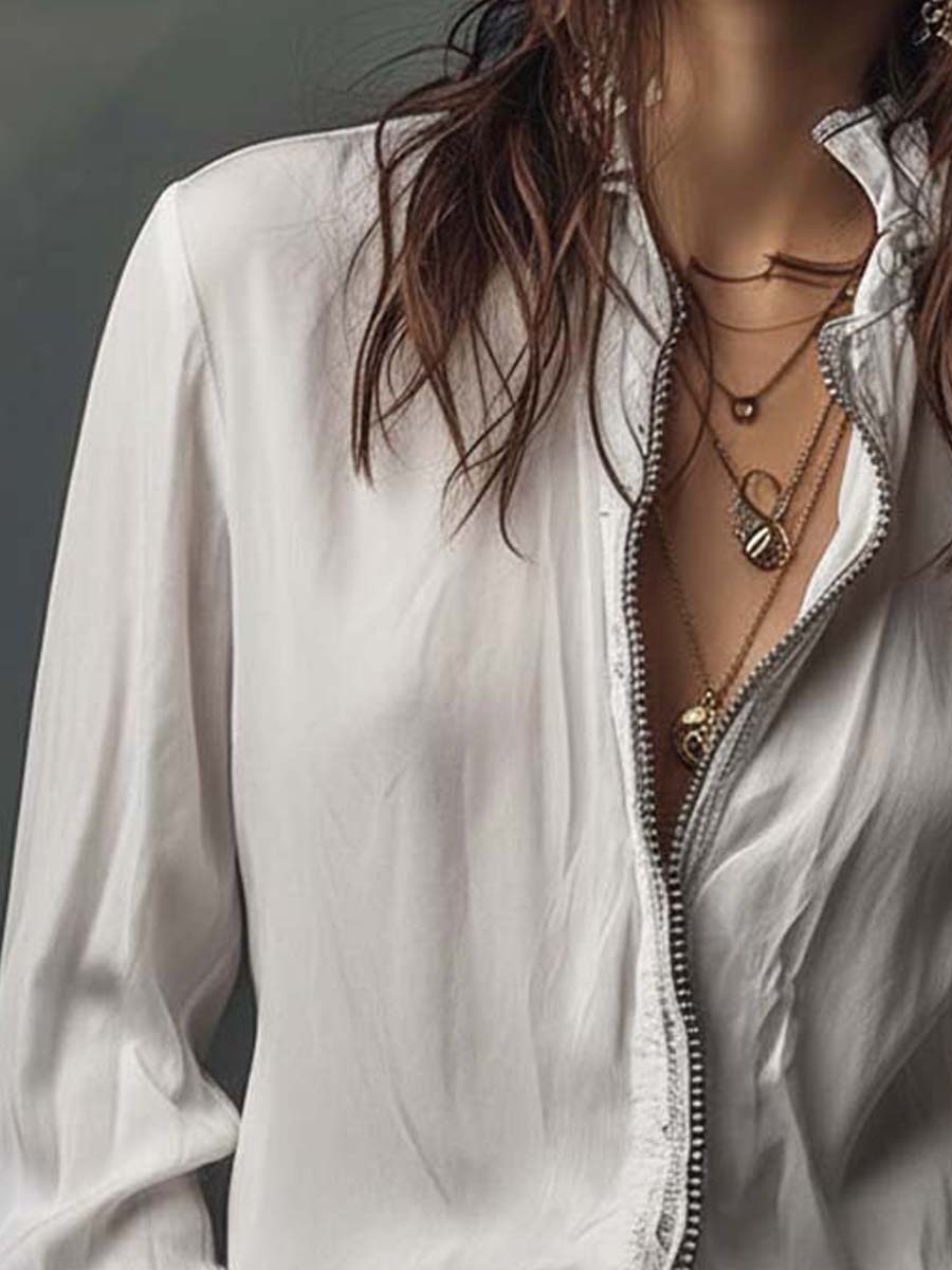 Sophisticated women's zip-front shirt, long sleeve, with trendy bell cuffs for a tailored look.