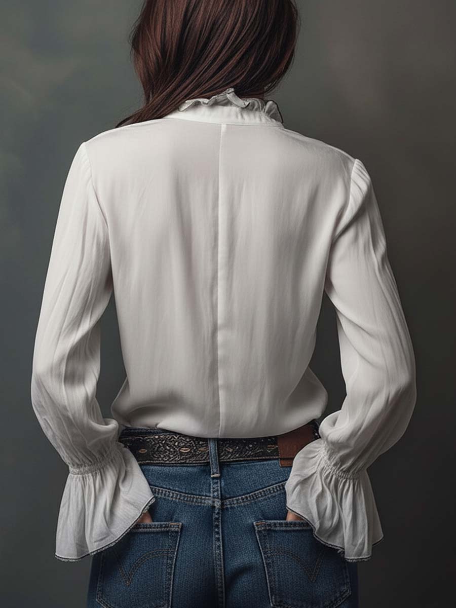 Fashionable women's zip-front blouse, long sleeve, with elegant bell cuffs, suitable for office.