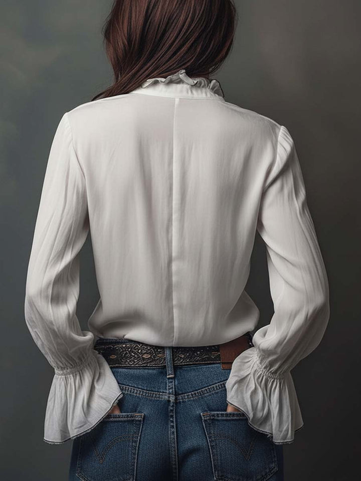 Fashionable women's zip-front blouse, long sleeve, with elegant bell cuffs, suitable for office.