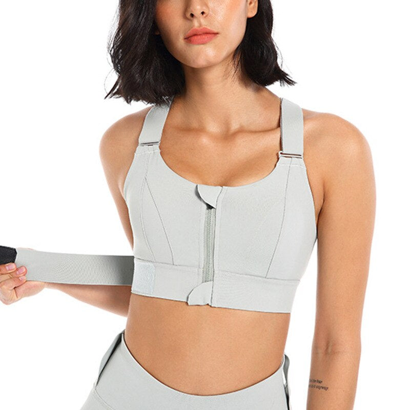 Premium women's sports bra with zip front & back support, great for high-intensity fitness.