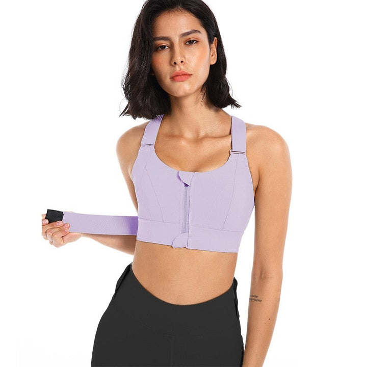 Durable zip-front sports bra for women's fitness, designed with strong back support.