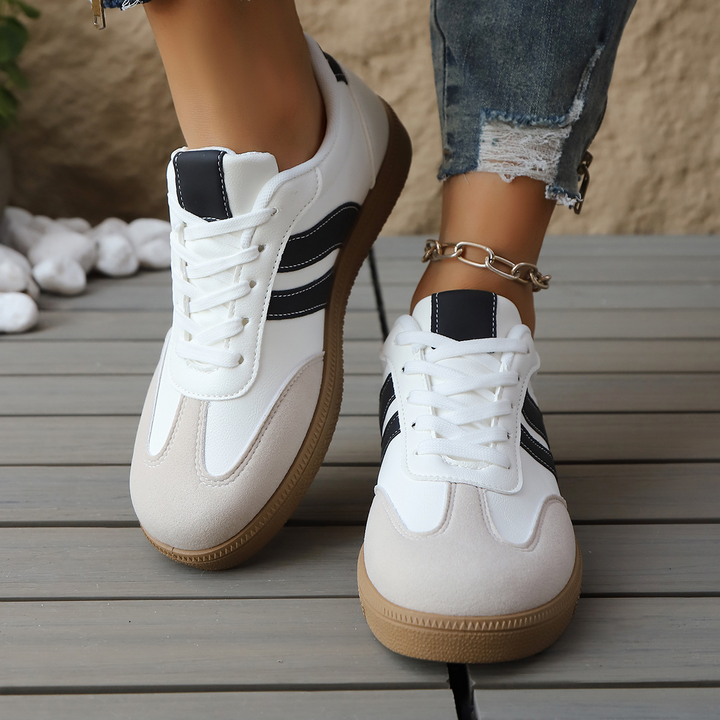 Streetwear-ready Zippa women's retro sneakers. Classic low-top design with cushioned comfort for fashion.