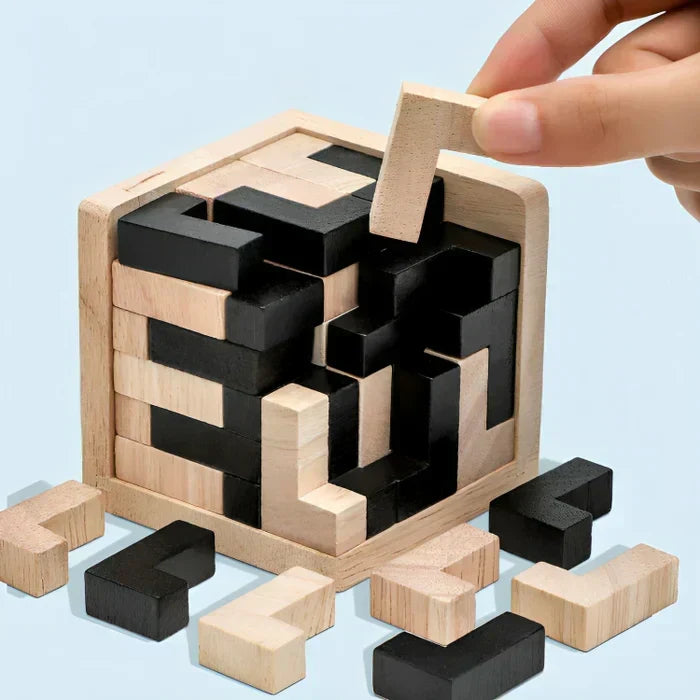 Child playing with a wooden 3D brain teaser puzzle, an educational toy enhancing problem-solving and spatial awareness.
