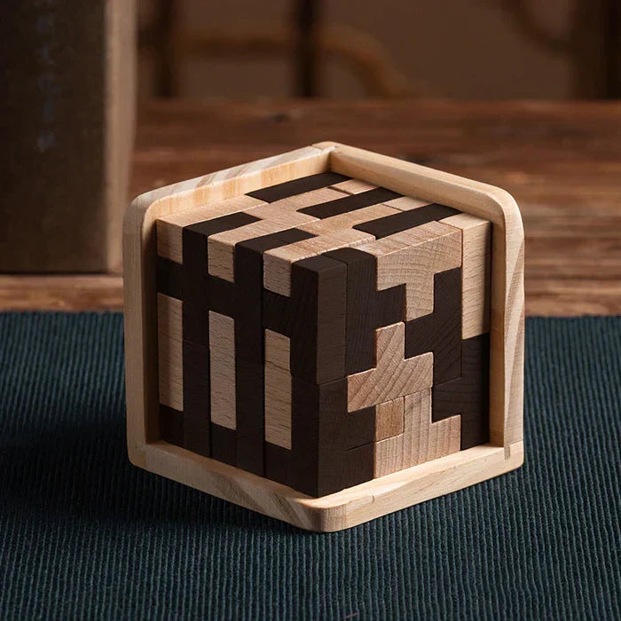 Hand-assembled wooden puzzle cube, a stimulating 3D brain teaser for all ages. Boosts spatial reasoning & focus.