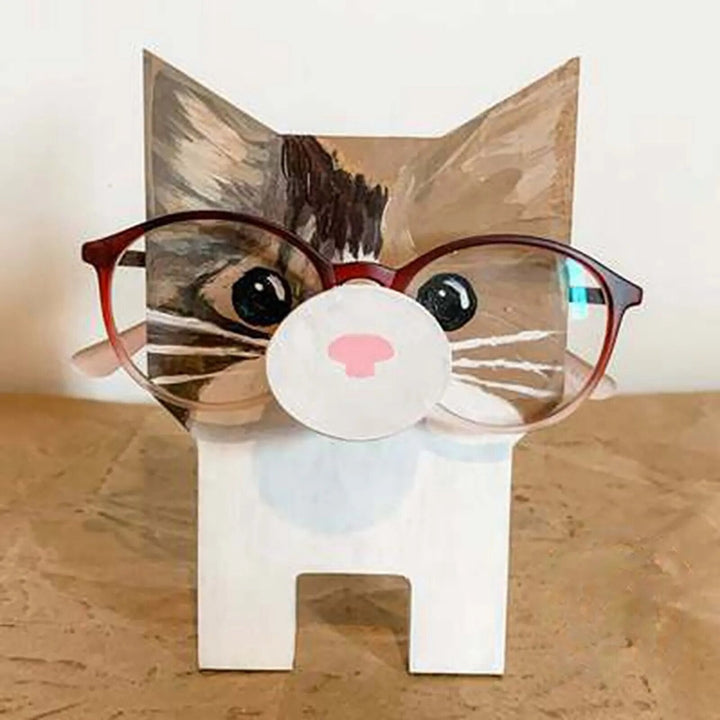 Elegant wooden elephant glasses stand, stylish desk decor & practical eyewear organizer.