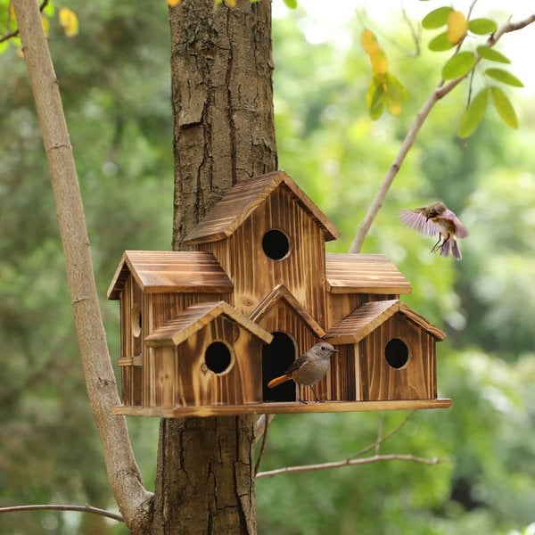 Natural wood birdhouse for garden, perfect for outdoor bird nesting