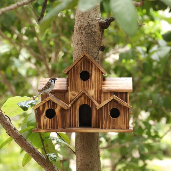 Functional wooden birdhouse, an essential outdoor item for garden birds