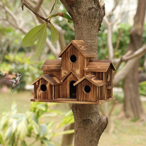 Birdhouse made of wood, designed for nesting and garden wildlife
