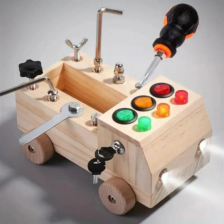 Close-up: Toddler hands engaging with latches & gears on a wooden busy board. Fine motor skill development toy.