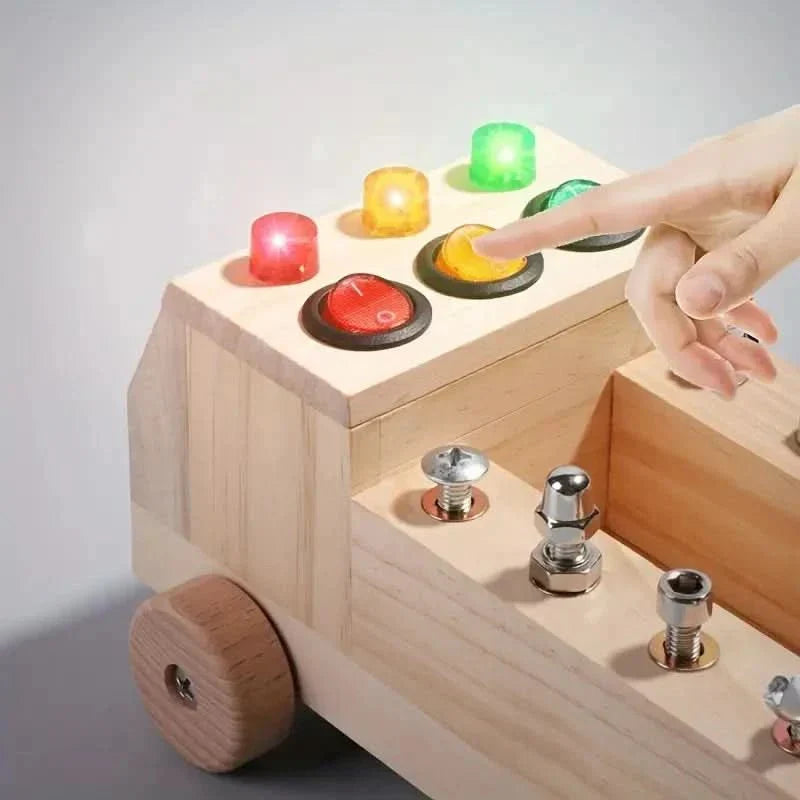 Child playing with a multi-activity wooden busy board, enhancing fine motor skills & cognitive development.