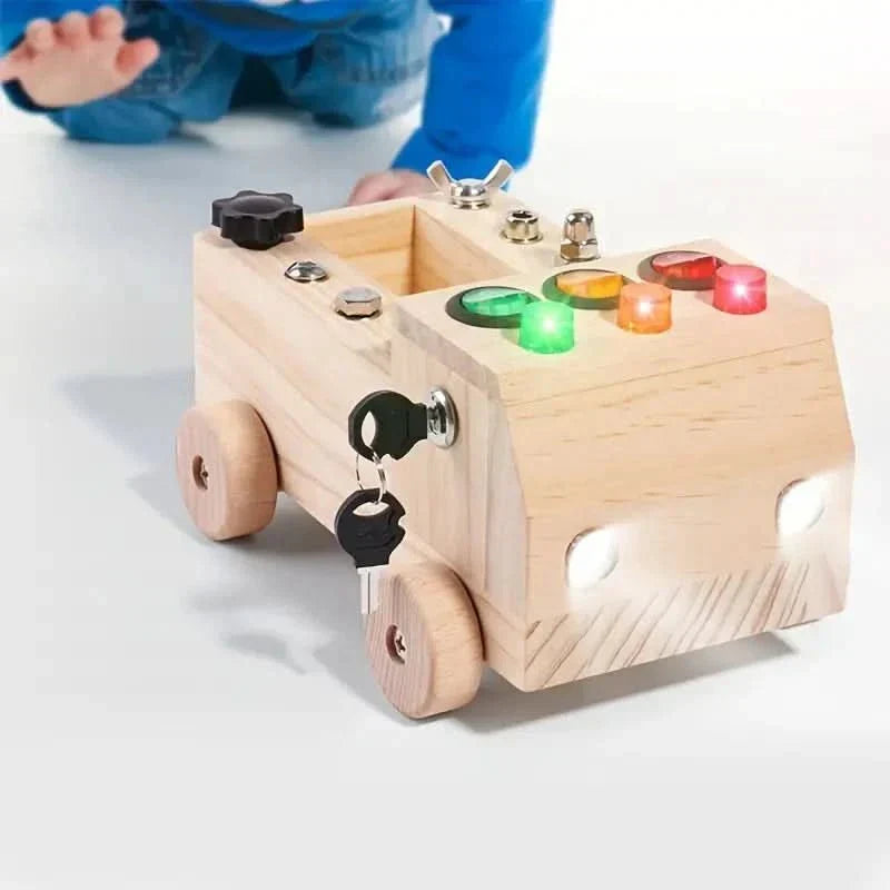 Educational wooden busy board for preschool learning, featuring various interactive elements & sensory activities.