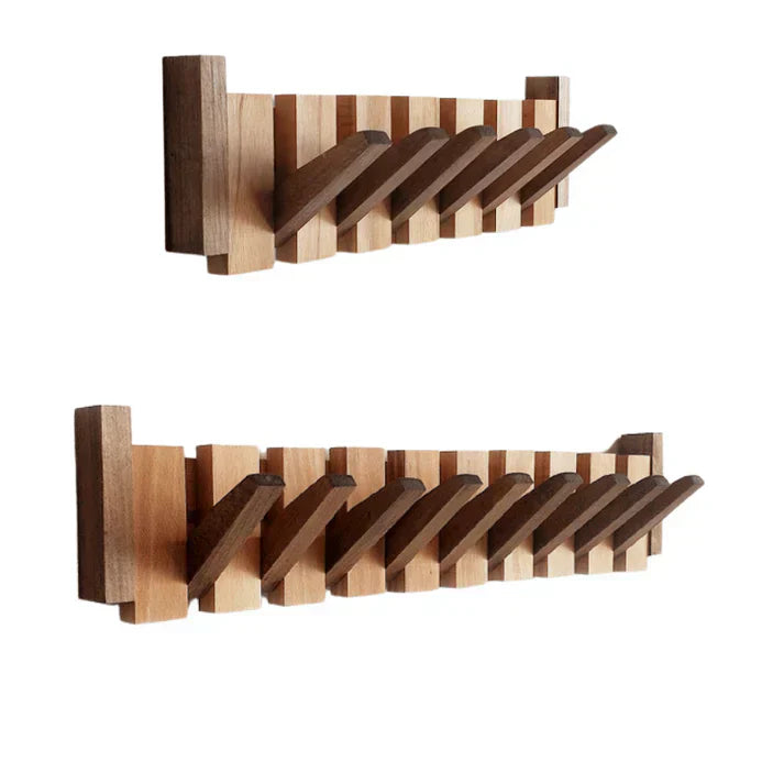 Wall mounted wooden coat rack with piano key accents and multiple hooks for efficient storage
