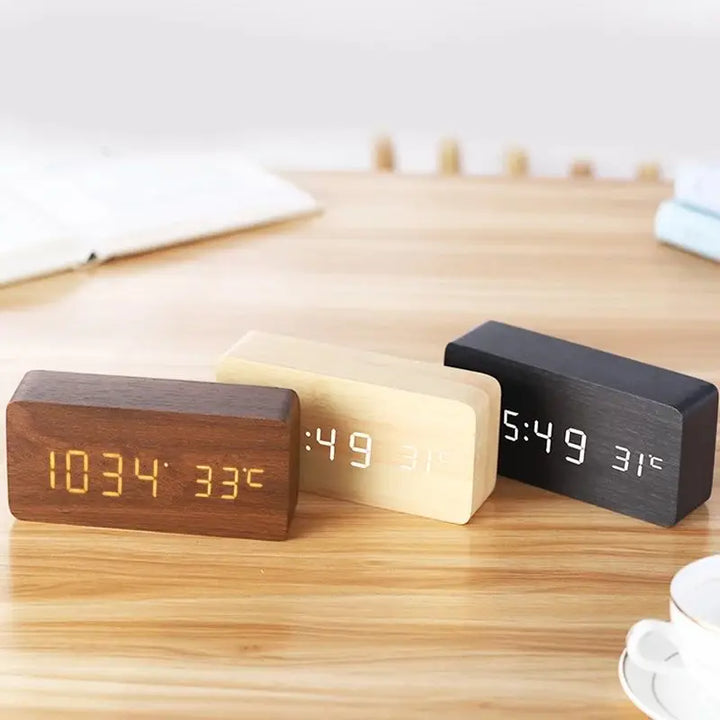 Eco-friendly WoodSync LED alarm clock made of wood, showing time and temperature, silent operation