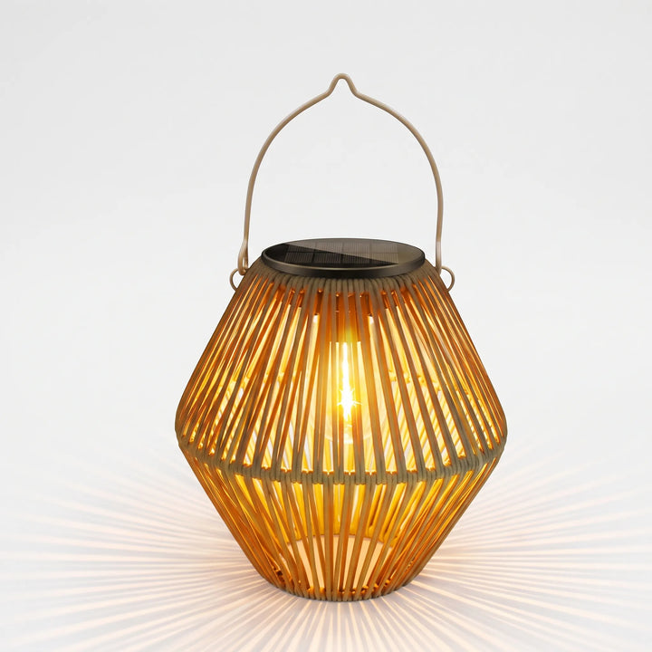 Decorative woven solar outdoor lantern casting ambient light. Cordless, weatherproof bamboo-look patio decor.