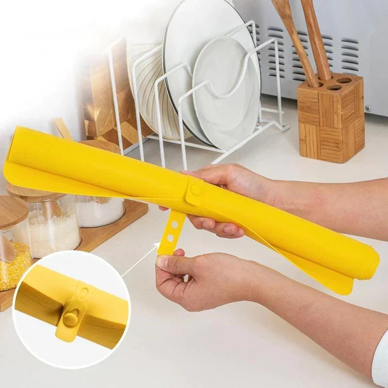 Versatile XL silicone kitchen mat; ideal for baking, pastry work, & as a non-stick countertop protector. Food-grade.