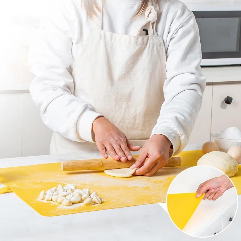 Extra large silicone baking mat with non-stick surface, perfect for dough, cookies, & oven use. Food-grade & easy to clean.
