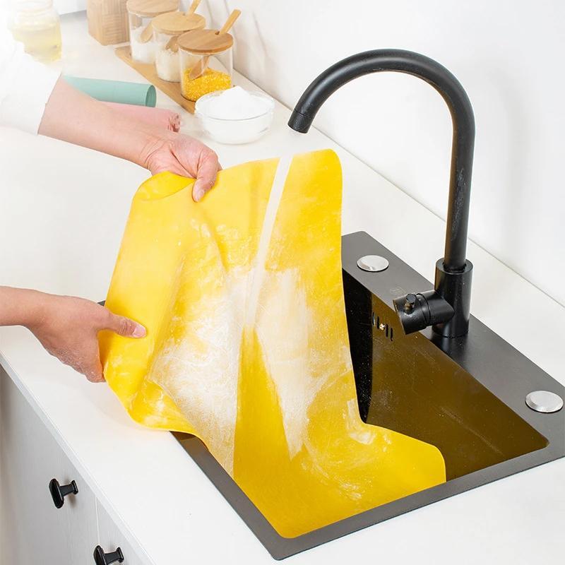 XL non-stick silicone pastry mat, great for rolling dough, baking cookies, & protecting kitchen countertops. Oven safe.
