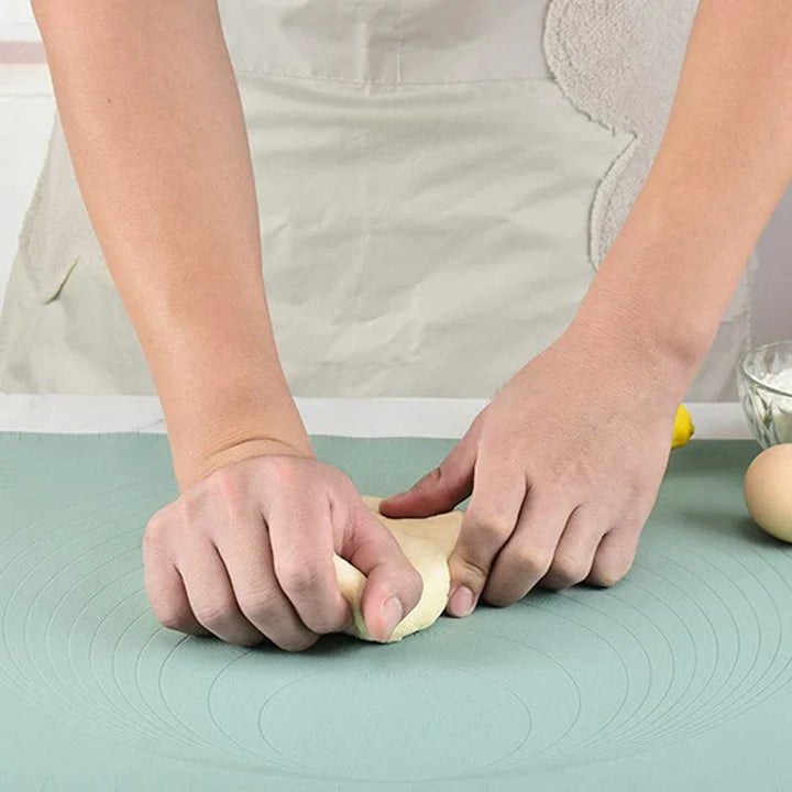 Non-stick XL silicone kitchen baking mat, easy-to-clean & oven-safe. Ideal for dough, pastries, and general cooking tasks.