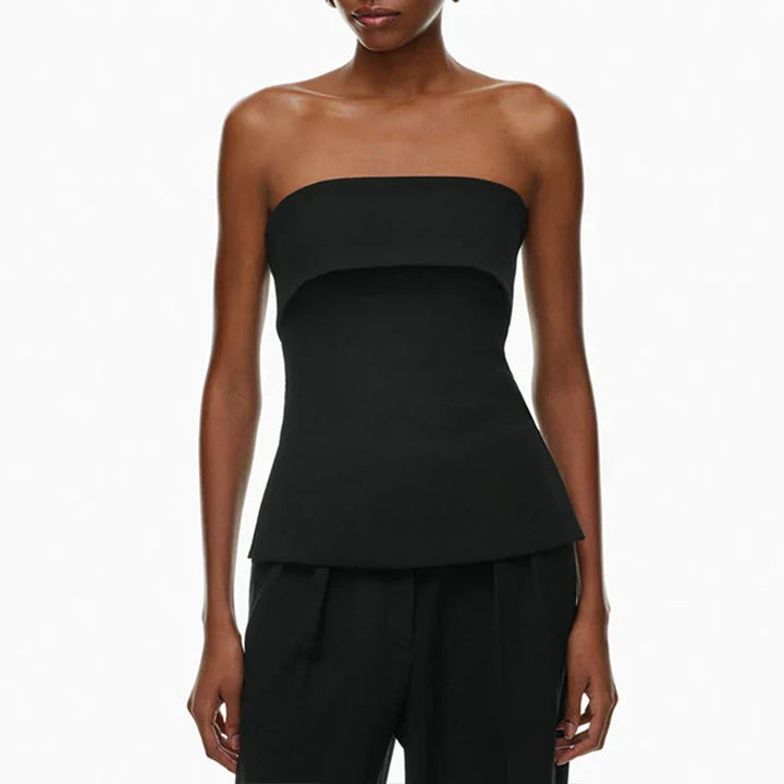 Black strapless tube crop top for women. Versatile party top, modern casual summer style.