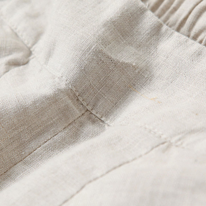 White women's relaxed fit wide-leg pants, high-waisted for a comfortable and chic casual look.