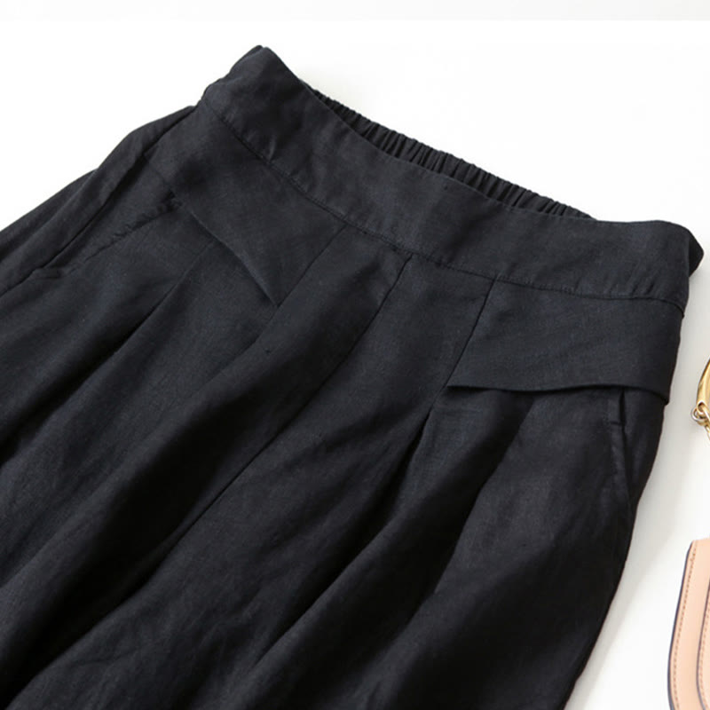 Blue women's relaxed fit wide-leg trousers, high-waisted for comfortable everyday fashion.