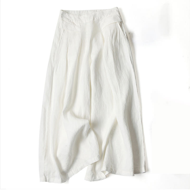 Beige women's versatile wide-leg trousers, relaxed fit for comfortable high-waisted style.