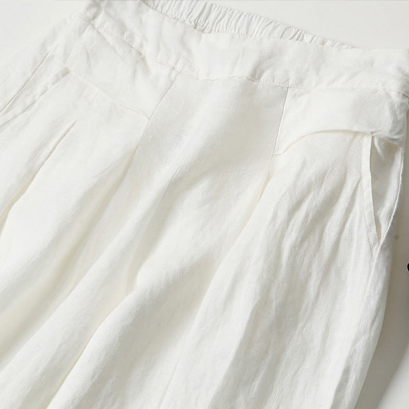 Black relaxed fit wide-leg women's pants, comfortable and high-waisted for effortless style.