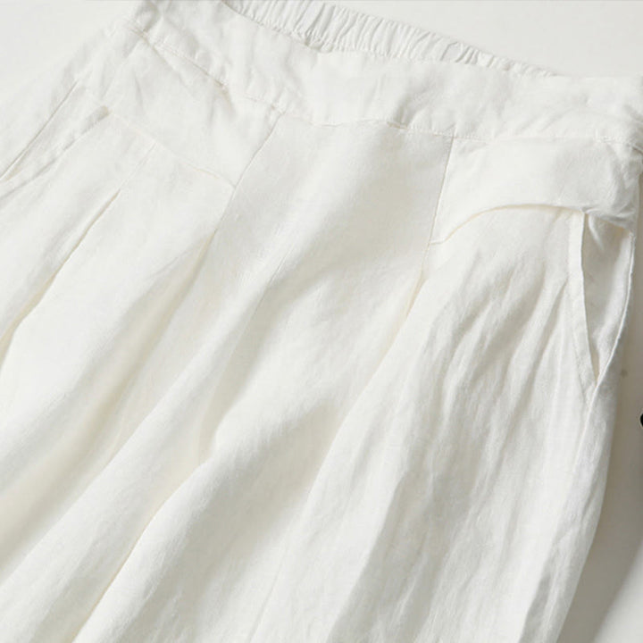 Black relaxed fit wide-leg women's pants, comfortable and high-waisted for effortless style.