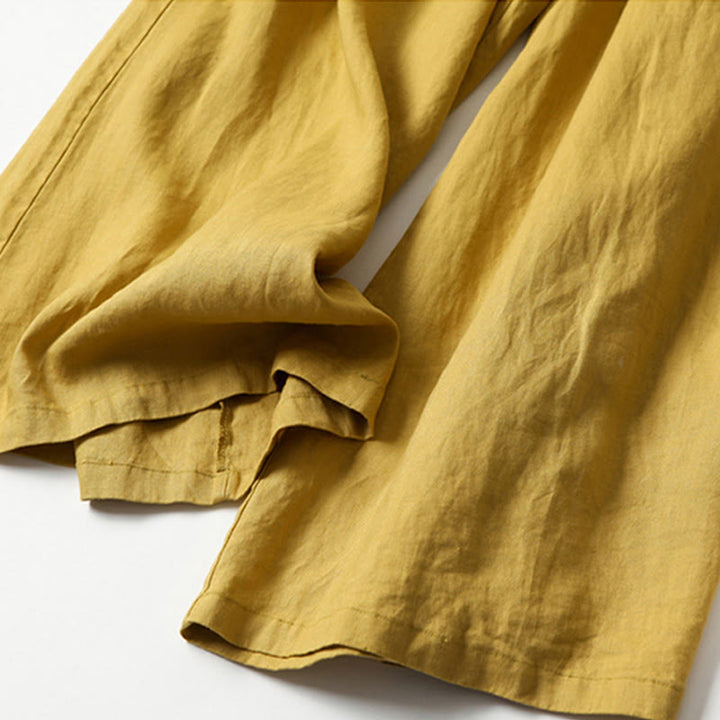 White women's comfortable wide-leg pants, relaxed fit for a chic, casual look.