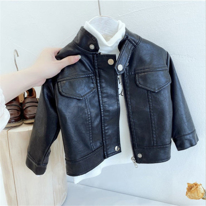 Young boy wearing a classic black PU leather zip-up jacket, perfect for fall fashion.