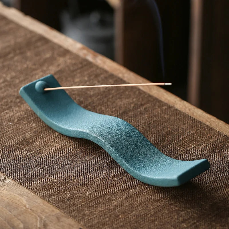Zen Wave ceramic incense holder for modern home decor. Perfect for meditation, relaxation, and aromatherapy.