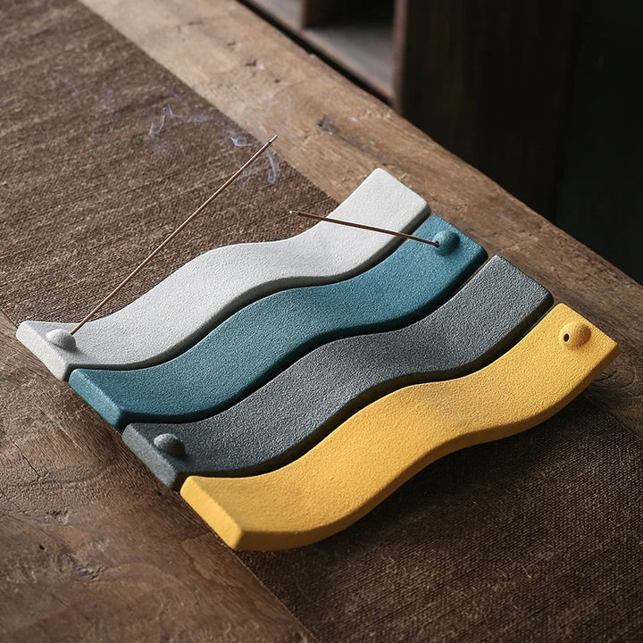 Stylish ceramic incense holder with unique wave design. Ideal for zen home decor, fragrance, and meditation.