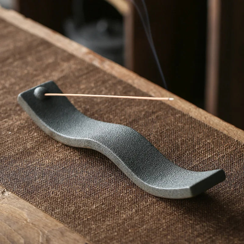 Artistic ceramic Zen Wave incense holder. Elevates home decor, supports meditation and mindfulness.