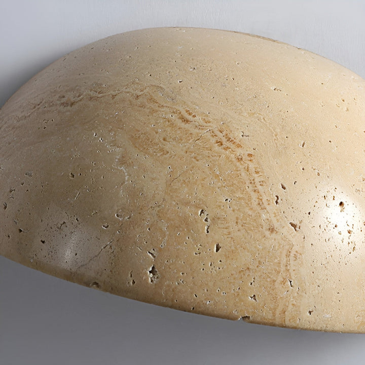 Wabi-Sabi LED stone wall lamp, a unique half-round sconce. Zen-inspired modern lighting for interior design.